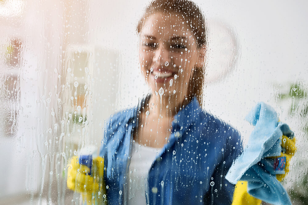 Woman Cleaning Windows